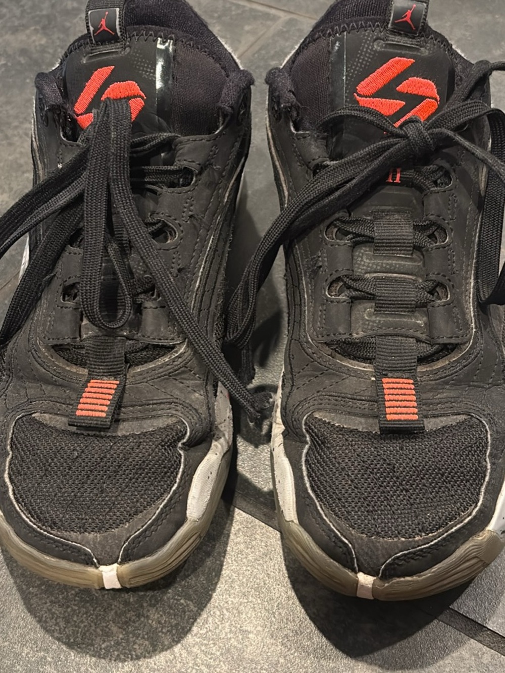 Jordan Kids Black Sneakers with Red Accents